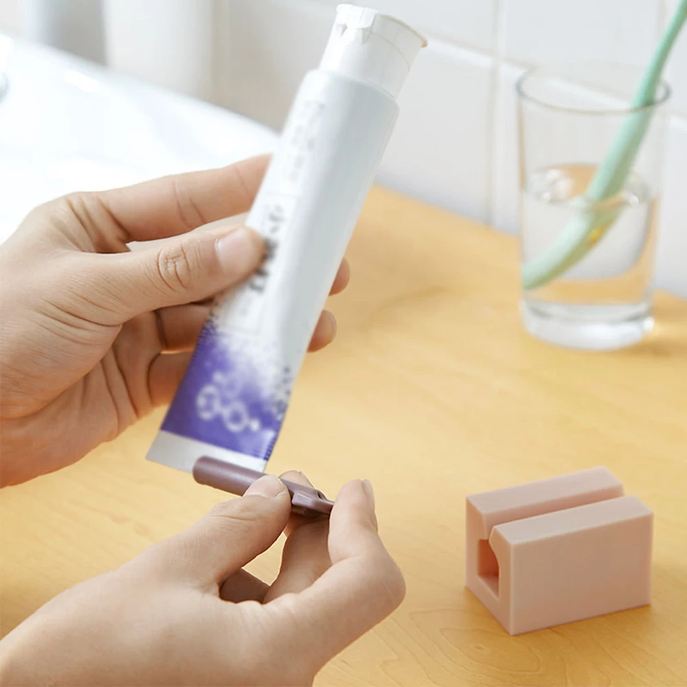 

Multifunction Plastic Tooth Paste Tube Squeezer Bathroom Easy Rolling Toothpaste Dispenser Bathroom Accessories