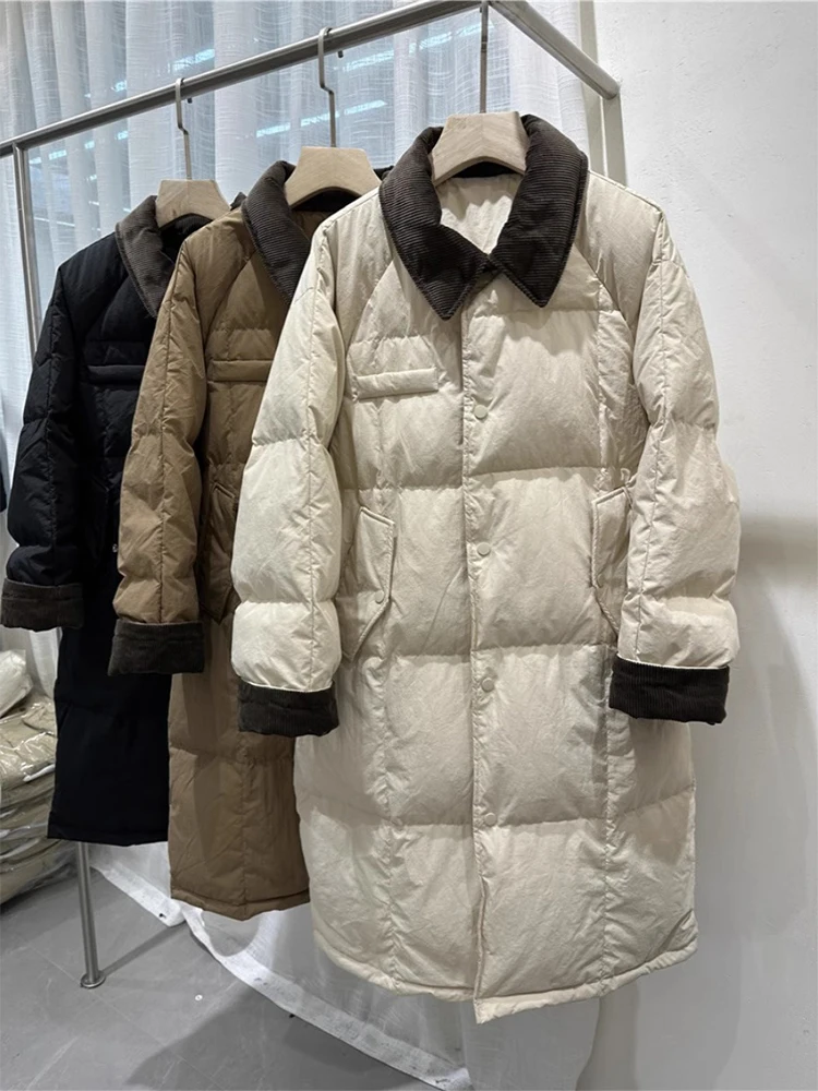 Пуховик женский средней длины с отложным воротником и хлопковой подкладкой