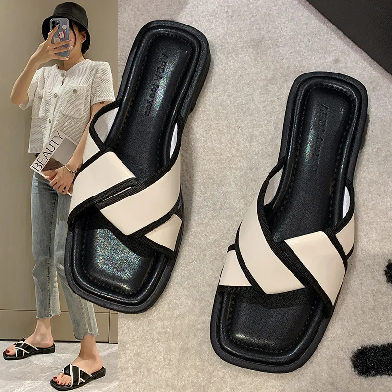 

2023 summer new fairy fashion lazy flat one word slippers Korean version female head open toe low heel outside to wear