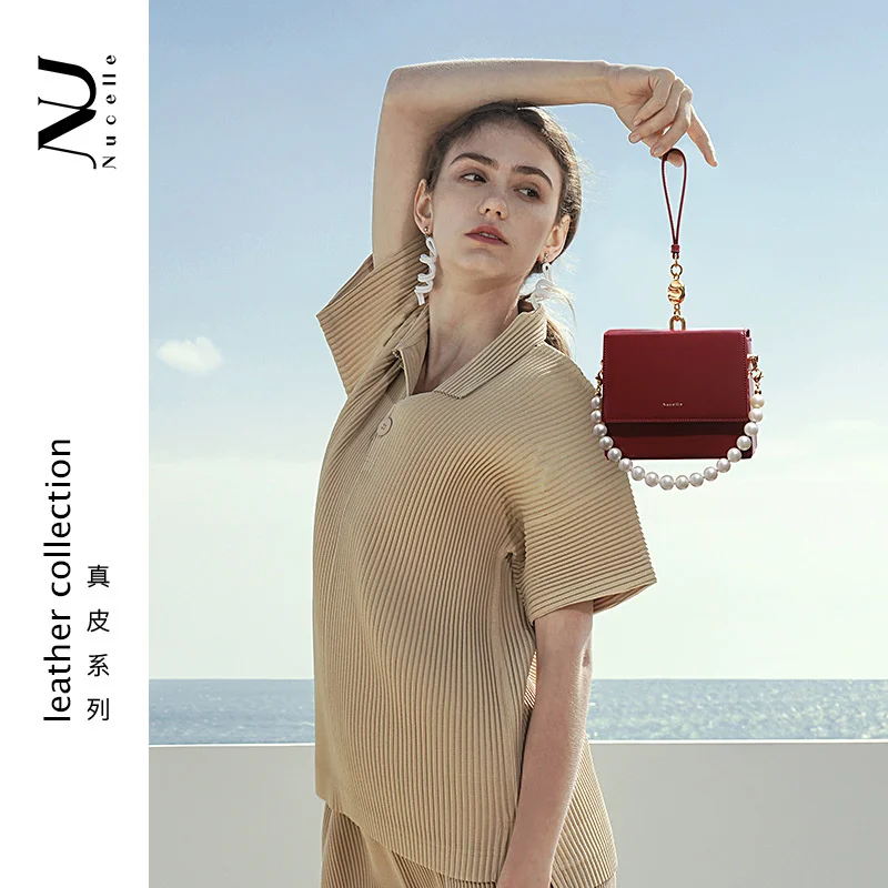 

Высококачественная Роскошная брендовая натуральная Новая Зеландия 2023 весенне-летняя Новая легкая маленькая популярная цепочка через плеч...