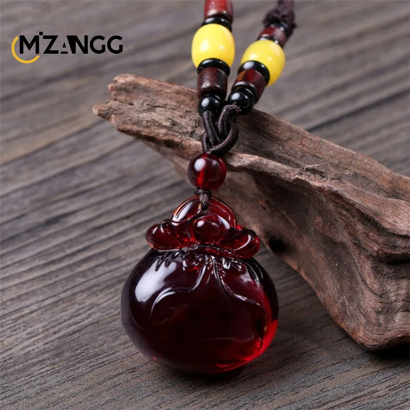 Подвеска из натурального янтарного пчелиного воска в этническом стиле