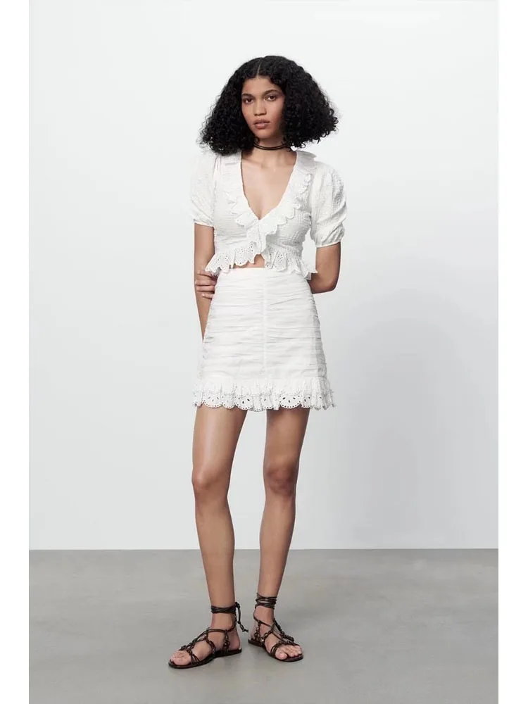 

2022 women's summer new layered decorative T-shirt stitching mini skirt suit French V-neck short top temperament skirt
