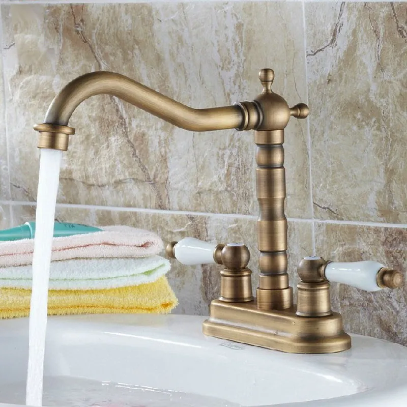 

Antique Brass Deck Mounted Dual Ceramic Handles 4" Center Hole Bathroom Two Holes Basin Faucet Swivel Mixer Taps mnf259