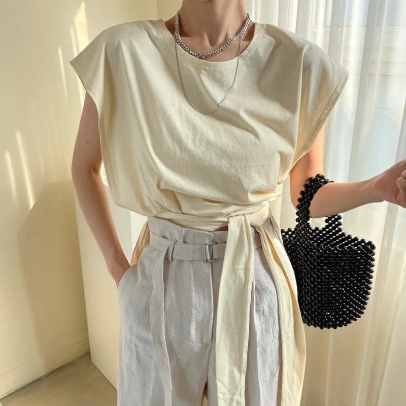 

Корейская летняя футболка во французском стиле без рукавов, с коротким спереди, с длинной спинкой, с завязками, женский топ в гонконгском ст...