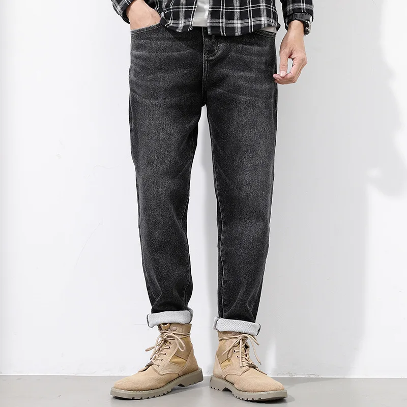 Small straight black men's jeans fashion trendy youth waist pants autumn and winter commuter stretch casual men's pants.