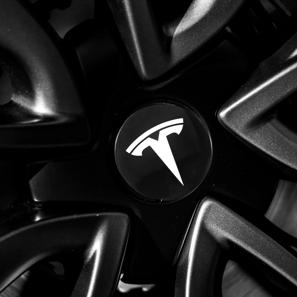Фото Наклейки-эмблемы на центральные колпачки колес Tesla 3D для Tesla Model 3, Model S, Model X, Coil Mod, WYE, K80 №4