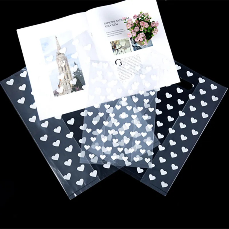 Продажа Пластиковые подарочные пакеты в форме сердца, прозрачные плотные пакеты для покупок с ручкой, упаковка для розничных бутиков, 50 шт.