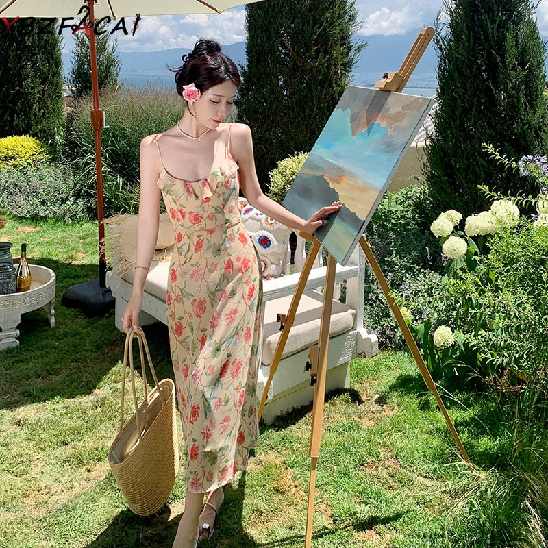 

Женское длинное шифоновое платье на тонких бретельках, с открытой спиной и оборками