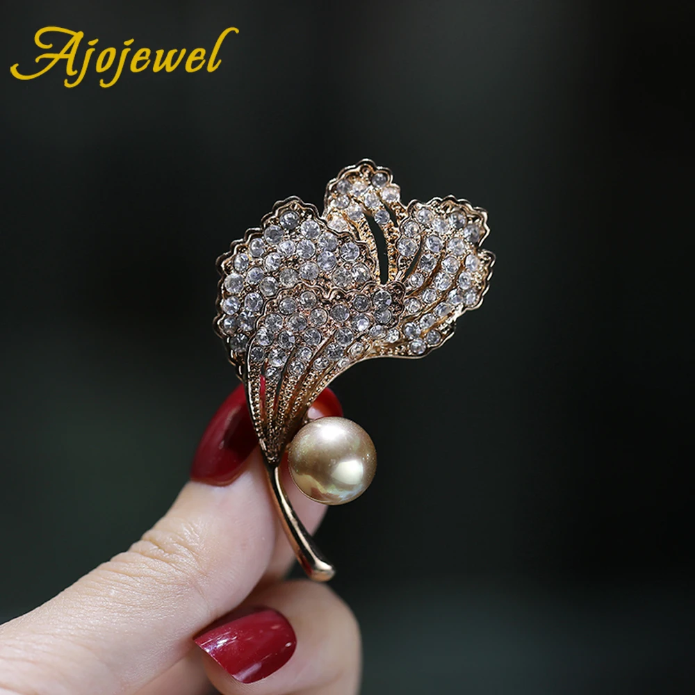 

Ajojewel Elegant Shell Brooches New Year 2023 Original Rhinestone Leaf Designer Brooch Suit Pin For Men Women Luxury Gifts