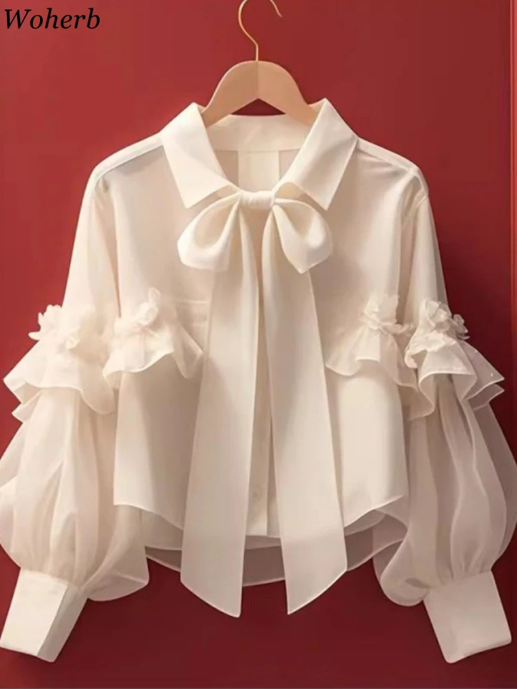 Женская блузка с бантом рукавами-фонариками и оборками