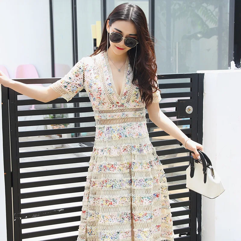 

New dress closed aristocratic temperament short sleeve v neck hollow out A word printed in the long boom