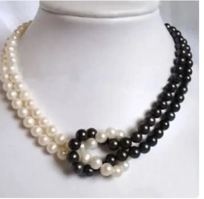Жемчужное ожерелье города. Жемчужное ожерелье города. Колье жемчуг с топазами. Бусы из чёрного жемчуга. Украшения из белого жемчуга.