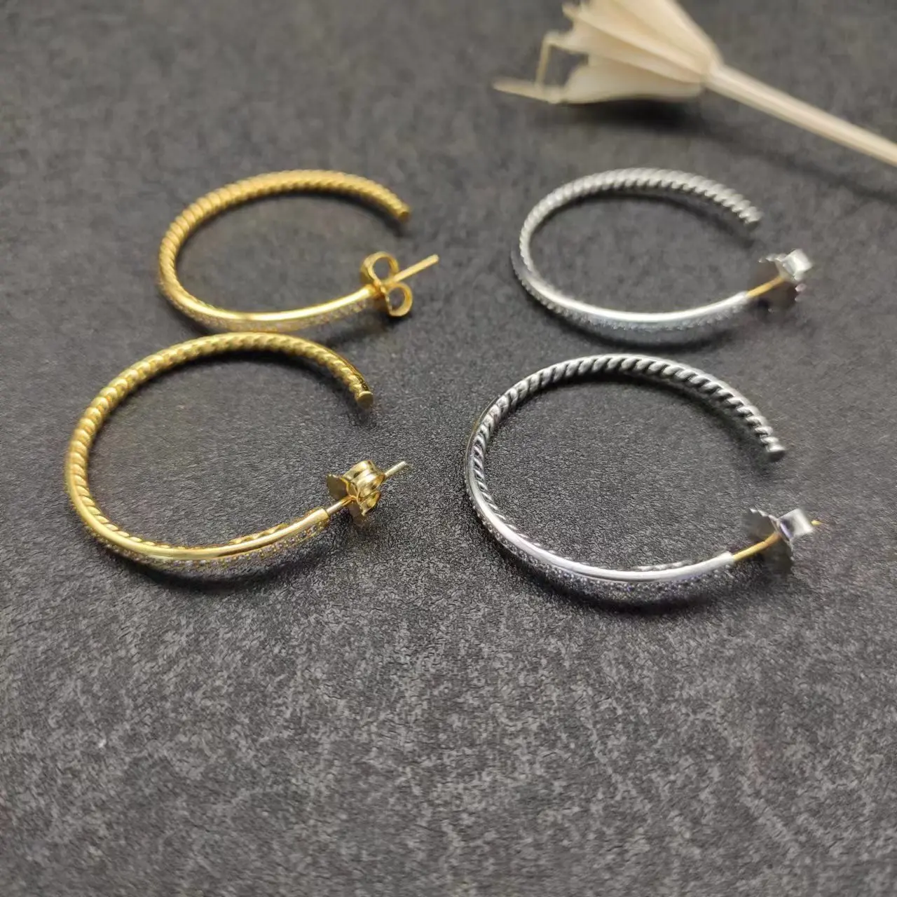 

DYS Diamond Earrings Brass with logo brand stud