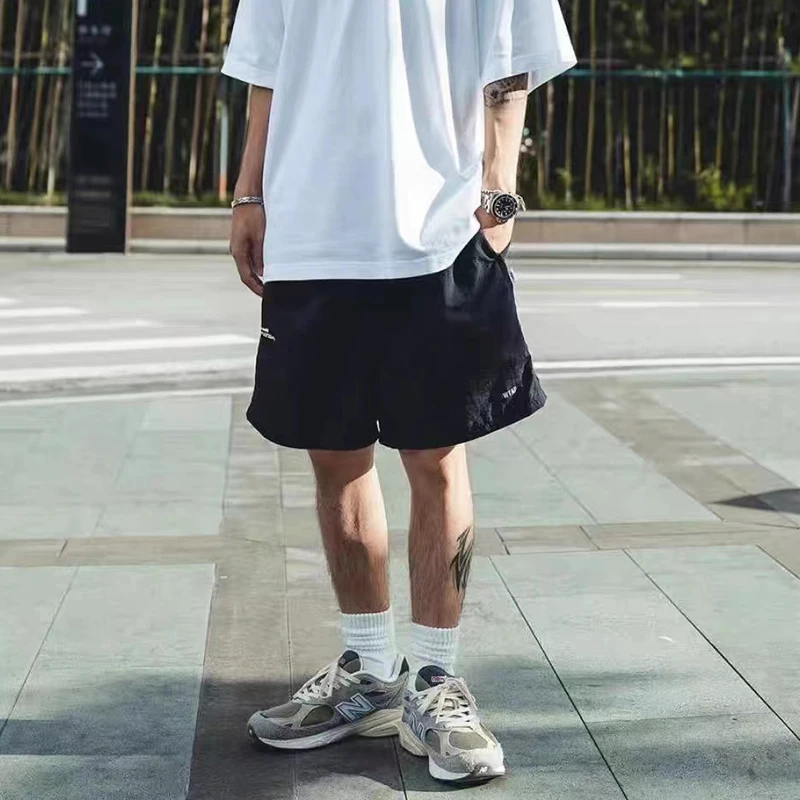 

WTAPS Men's Fashion Breathable Solid Color Quick Drying Shorts Thin Style Sand Loose And Comfortable Casual Pants