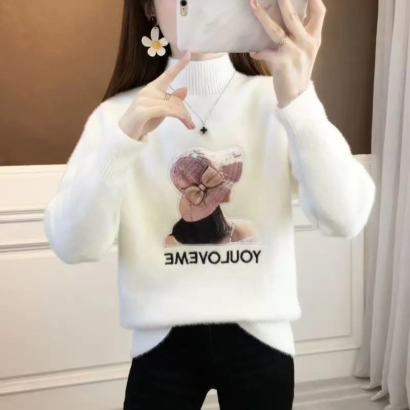 Женский однотонный вязаный свитер с высоким воротником