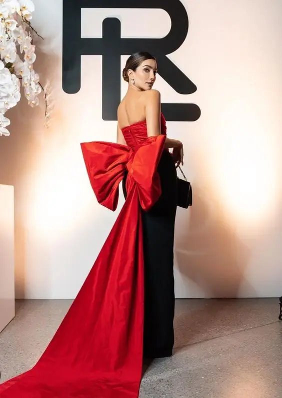 Кутюр черно-красные длинные вечерние платья-футляры с большой бантом сзади без