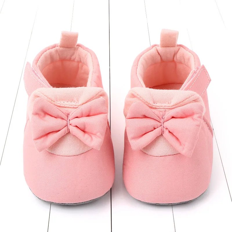 

Детская обувь с мультяшным бантом, милая обувь для новорожденных мальчиков и девочек, обувь для первых шагов на плоской мягкой нескользящей подошве, женская обувь