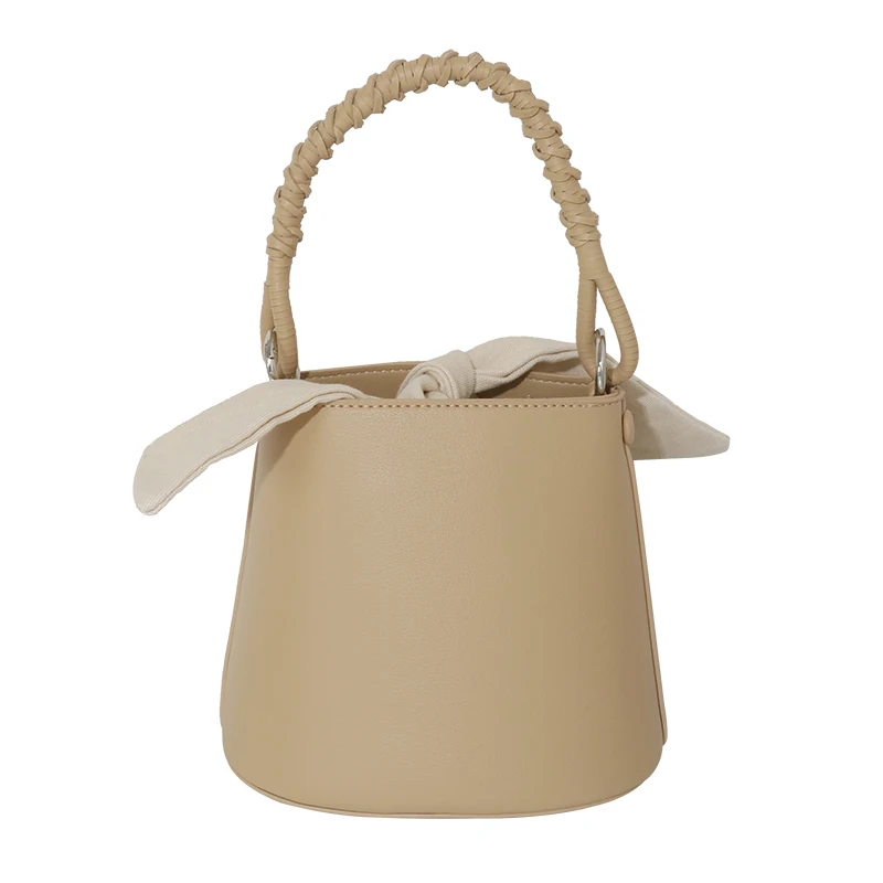 

Drawstring bucket bag female Korean niche design rabbit ears hand carry small bag retro barrel-shaped messenger shoulder bag