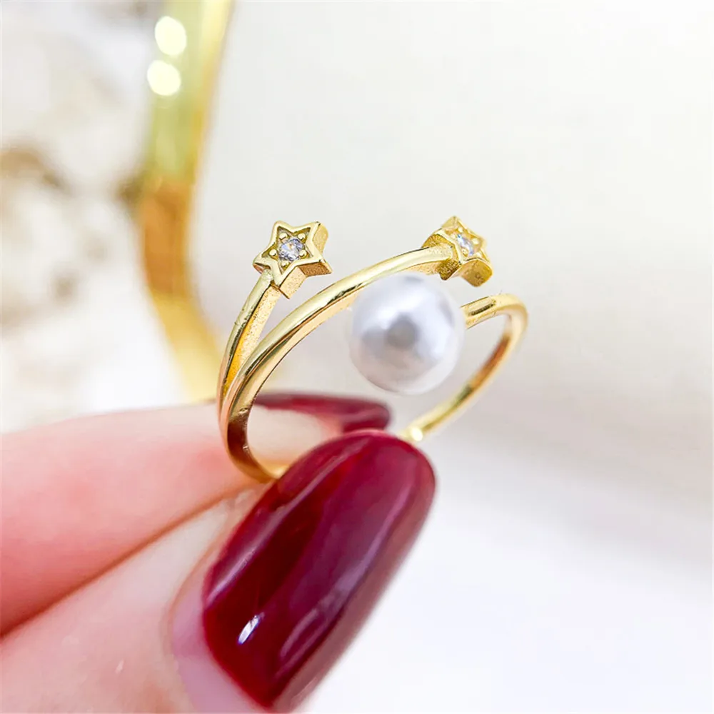 

Набор колец из серебра и золота с жемчугом, 7-10 мм