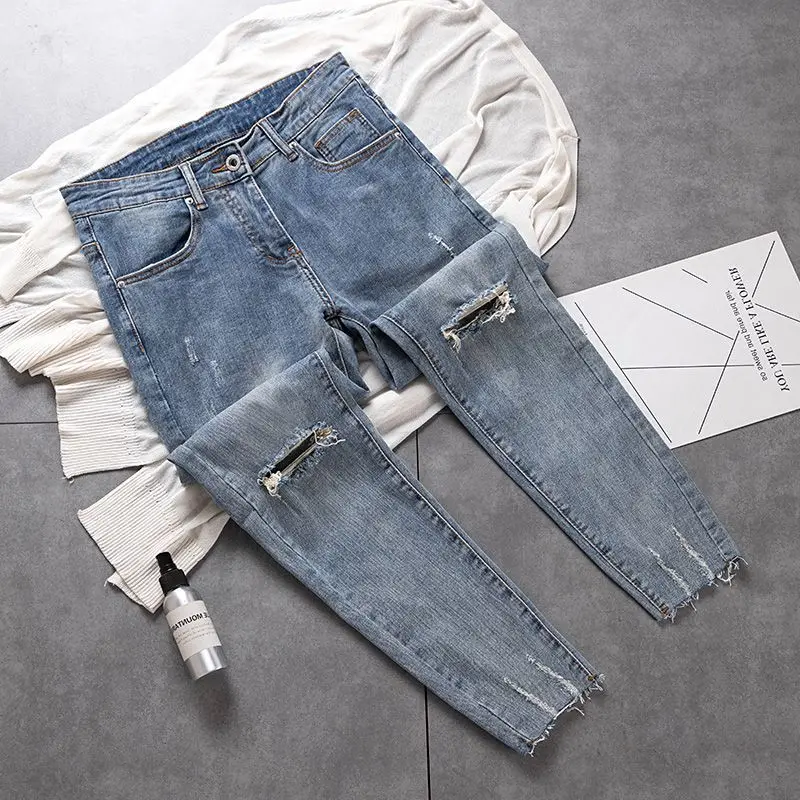 2023 Summer Thin Jeans Wool-edge Knee-knee Piercing Elastic Slimming Small Feet Pants Men's Clothing Nine-point Pants