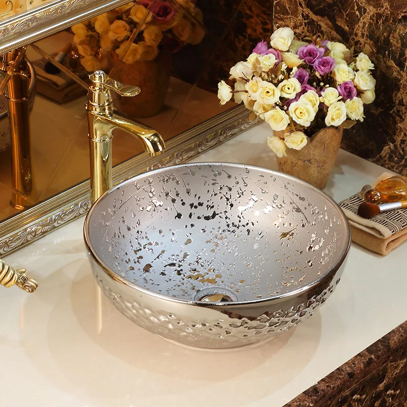

Individualized counter basin silver art basin ceramic oval washbasin domestic washbasin washbasin
