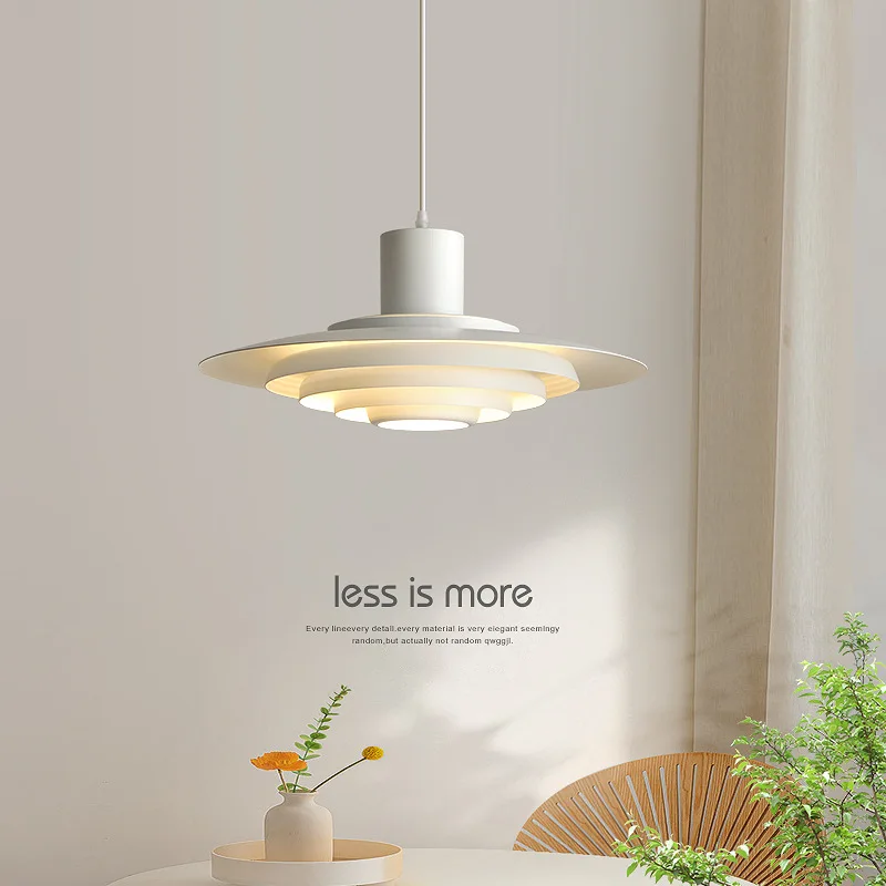 

Modern simple new restaurant chandelier Danish designer bar table lamp creative flying saucer circular Zhongshan lamp