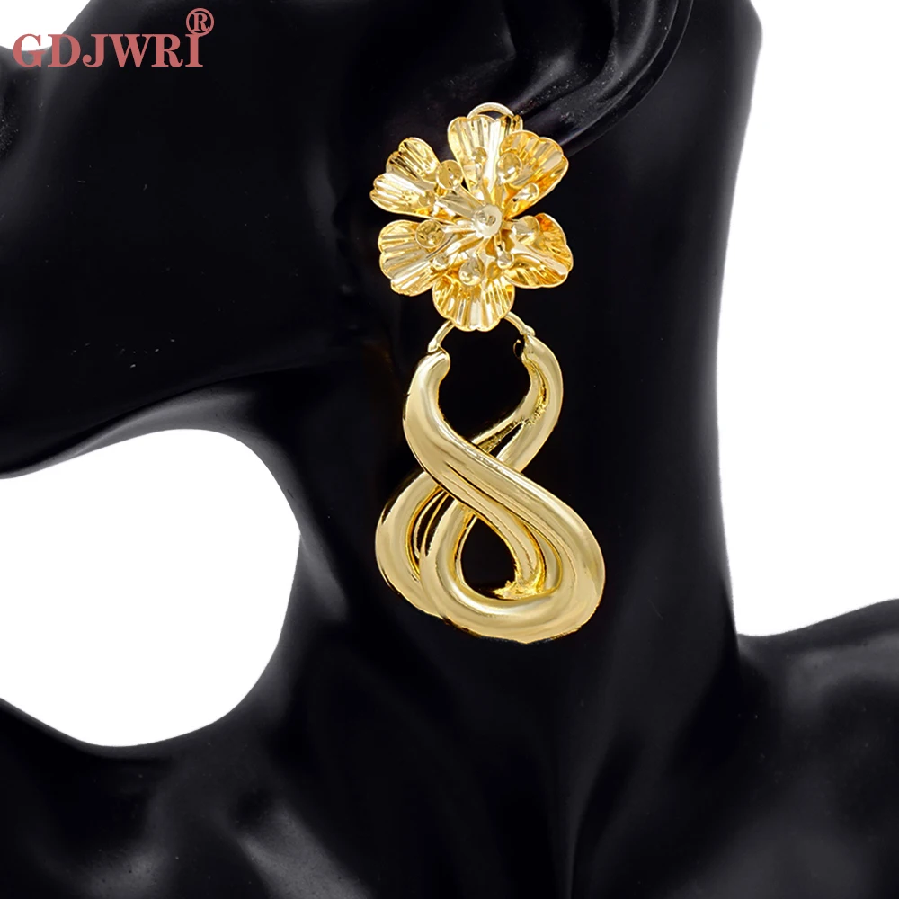 

Лидер продаж, новый дизайн, большие медные серьги-подвески неправильной формы золотого цвета для женщин, витые модные ювелирные изделия для...