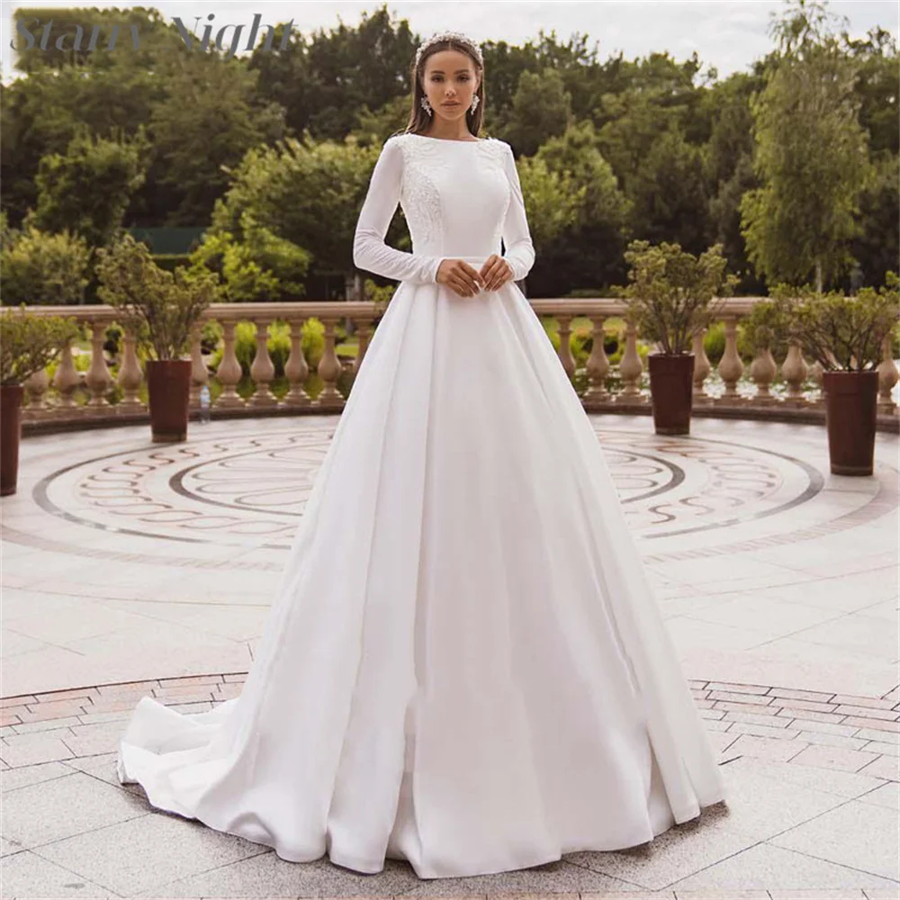 

Modest A Line Long Sleeves Wedding Dress Arabic O Neck Wedding Gown Court Train Satin Bridal Gowns فساتين مناسبة حسب الطلب