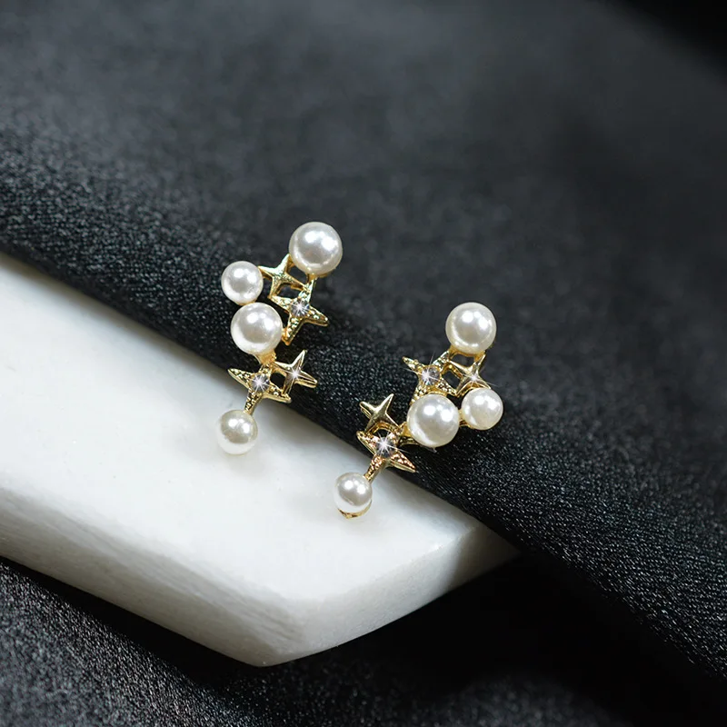 

Irregular Star Women's Pearl Stud Earrings Bohemian Sweet Female Ear Decoration Hollow Geometric Statement Tiny Elegant Jewelry