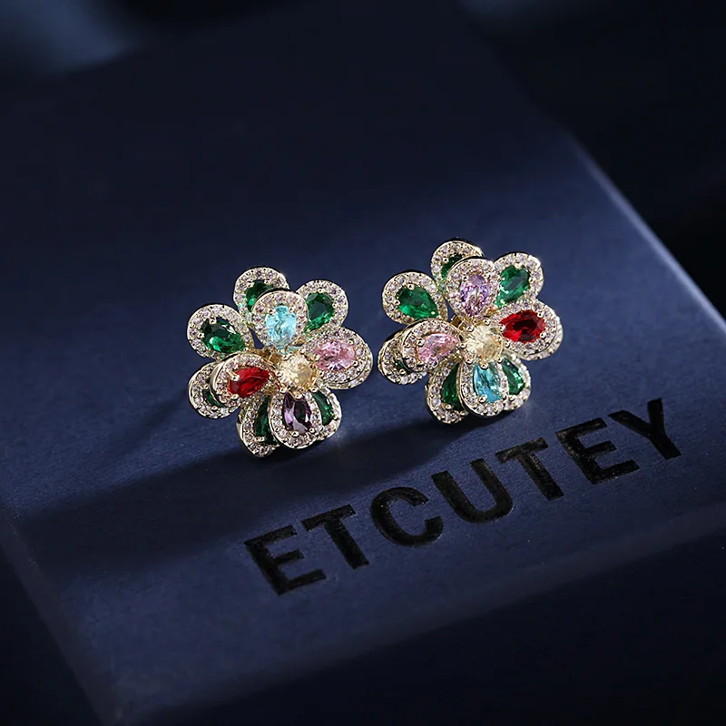 

Simple daily stereo camellia earrings in Europe and America