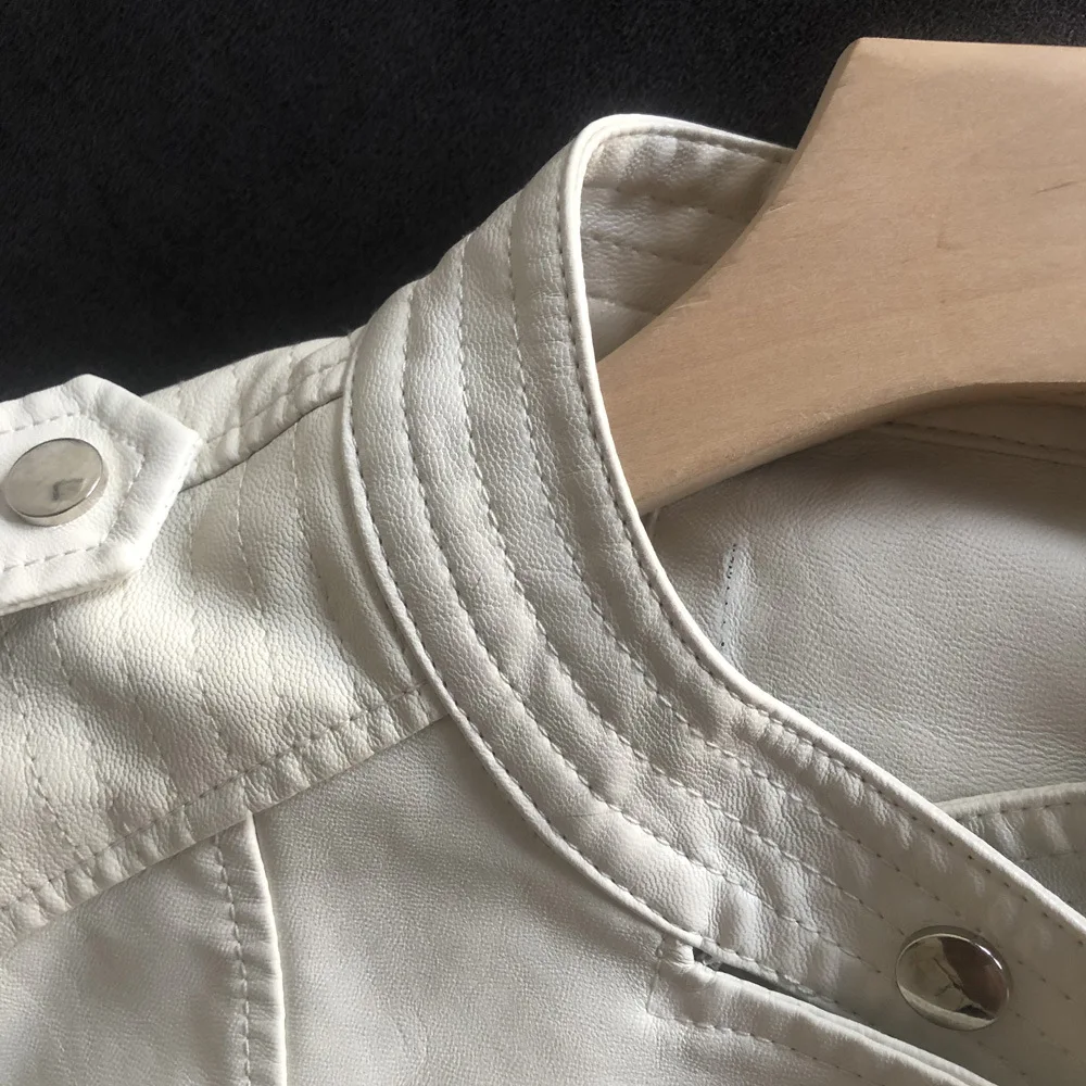 Spring and autumn short stand-up collar simple epaulettes women PU leather jacket slim small leather motorcycle coat