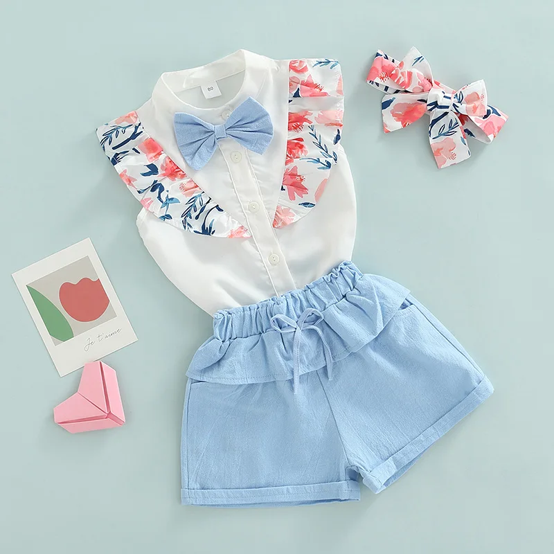 

Блузка без рукавов с бантом на пуговицах и шорты из хлопка и льна