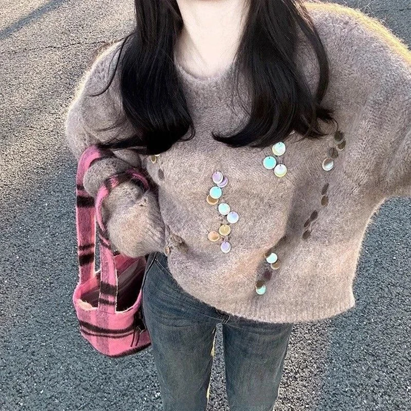 Женский трикотажный свитер с блестками