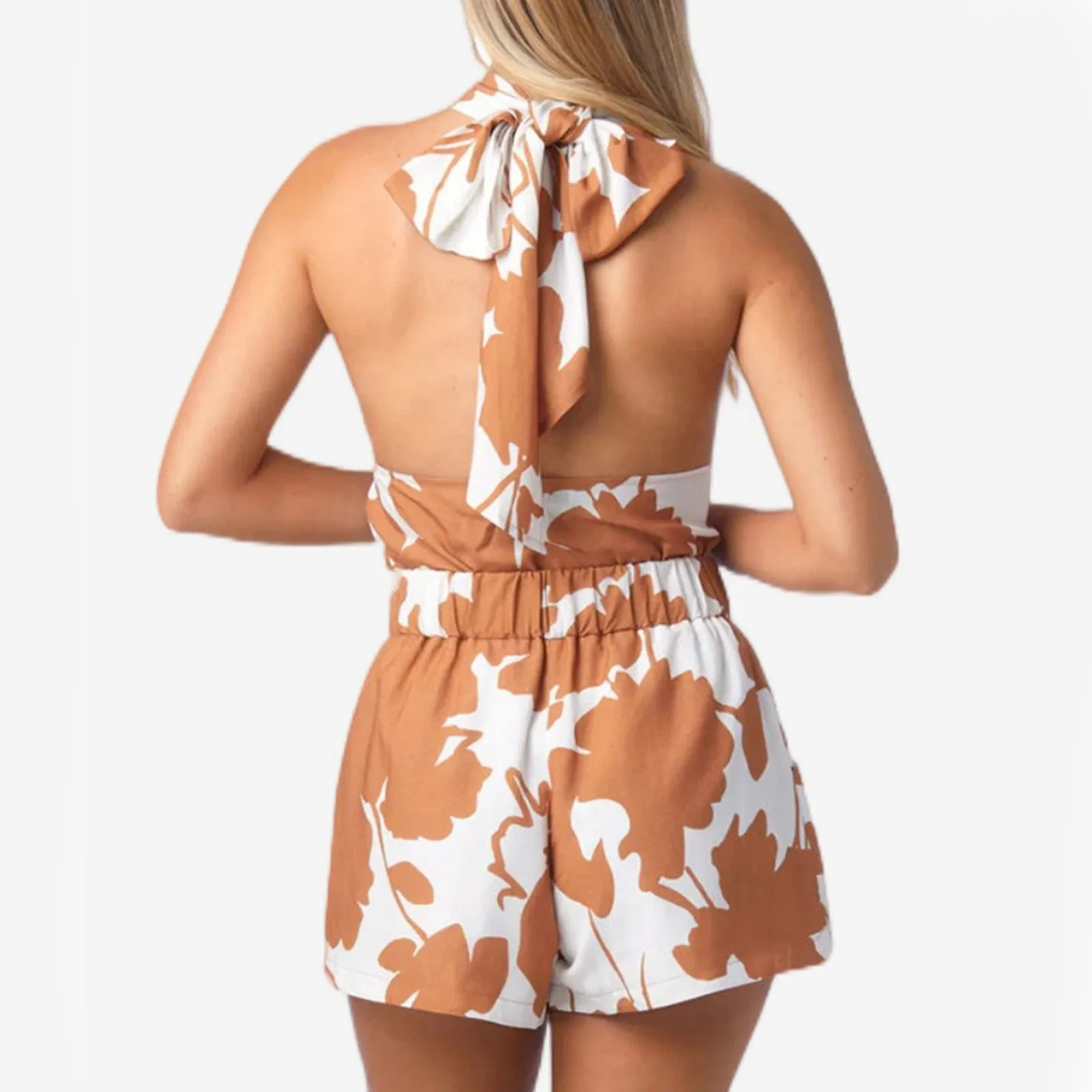 Костюм на шнуровке с цветочным принтом глубоким вырезом и широкими штанинами