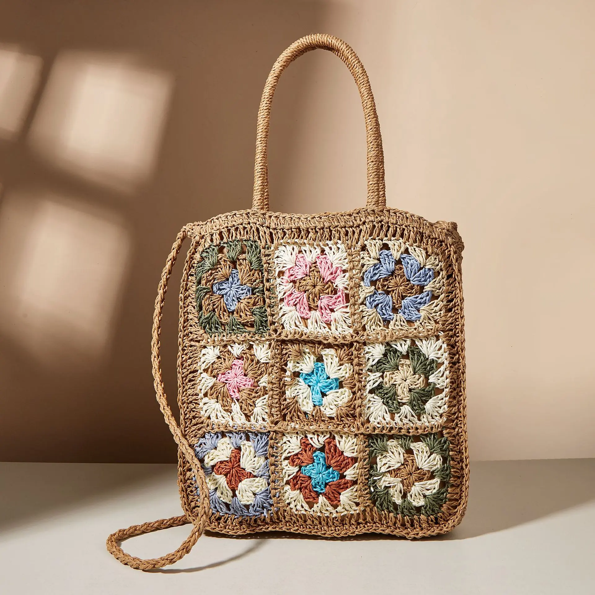 

2022 new fashion multicolor flower splicing woven straw bag one shoulder portable Mori holiday bag