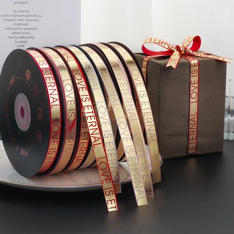 

45meters/roll 10mm full bronzing in printing English“love is eternal”polyester ribbon Valentine's Day Gift Wrapping Ribbons