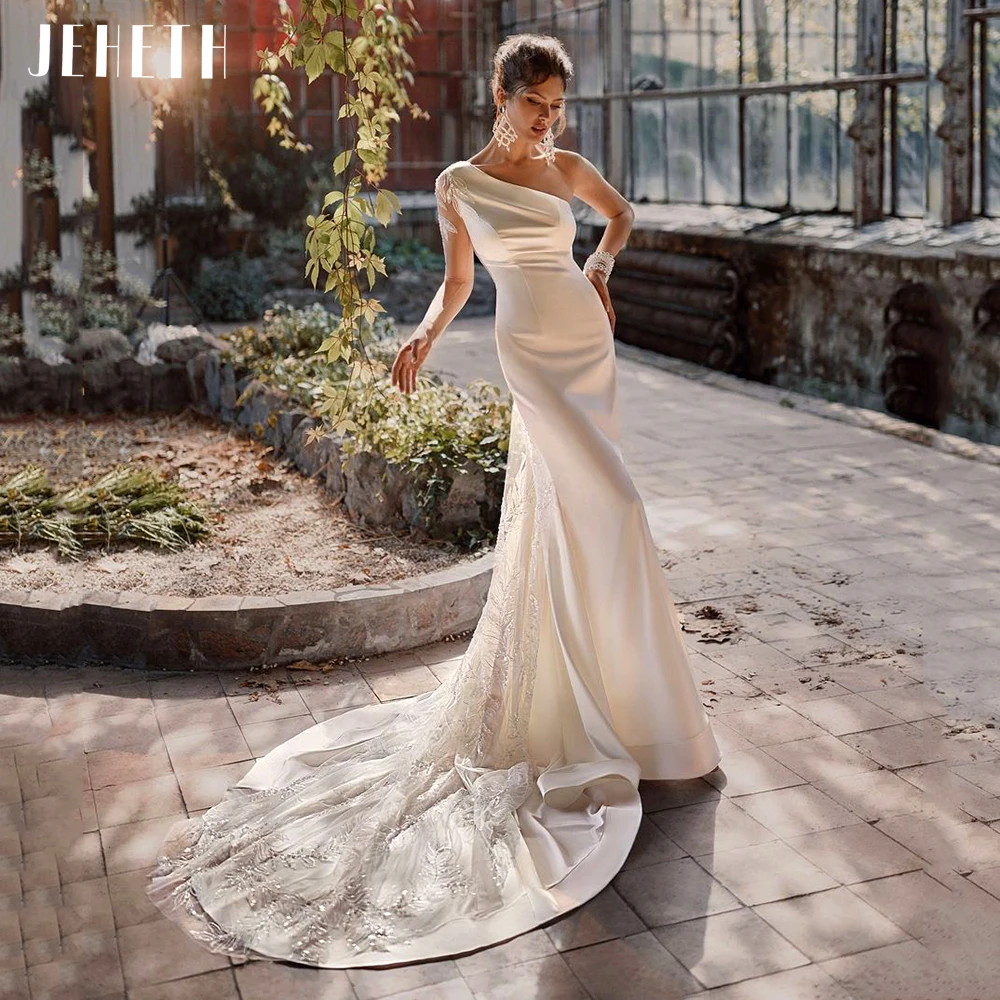 

JEHETH Elegant Mermaid Wedding Dress 2022 One Shoulder Long Sleeves Lace and Satin Ivory Bridal Gowns Dubai Backless Sweep Train