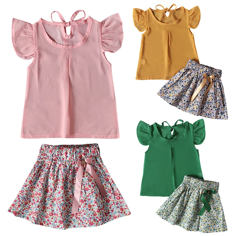 

Qunq Summer Girls' Solid Small Flying Sleeve Top + Bow Floral Short Skirt Bind Two Piece Set Streetwear kids Clothes Age 1T-8T