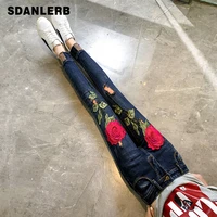 autumn and winter womens jeans embroidered flower high waist slimming fashionable all matching tappered denim pencil pants