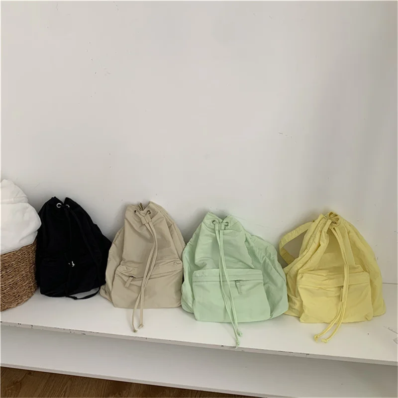 

Korean Fashion Women Backpack LightWeight Nylon Fabric Drawstring Backpack For Women Causal Designer Travel Female Small Bag