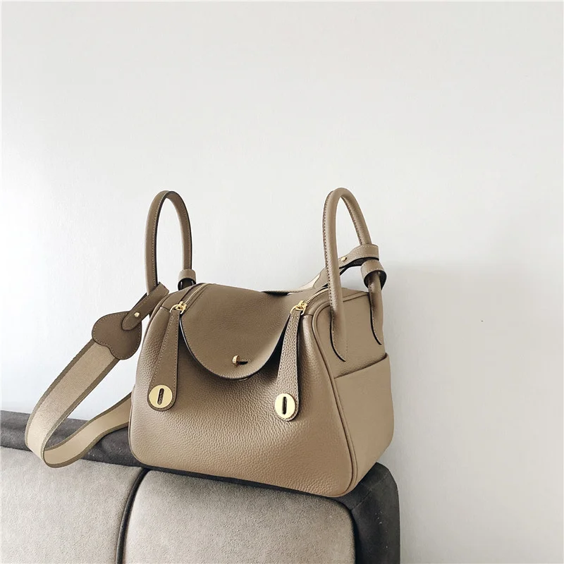 

Top layer togo cowhide leather women's bag 2023 new bucket bag fashion portable women's bag