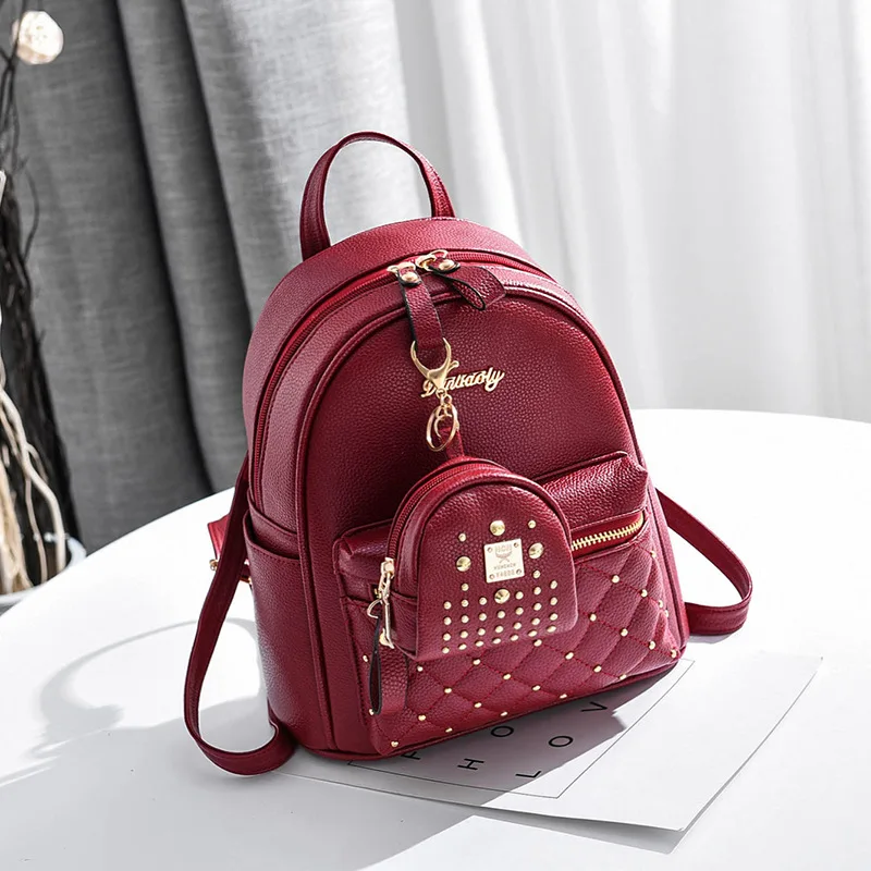 

TRAVEASY 2023 Fashion Rivet Mini Backpack Summer Girls School Backpack Korean PU Leather Solid Color Ladies Party Shopping Bags