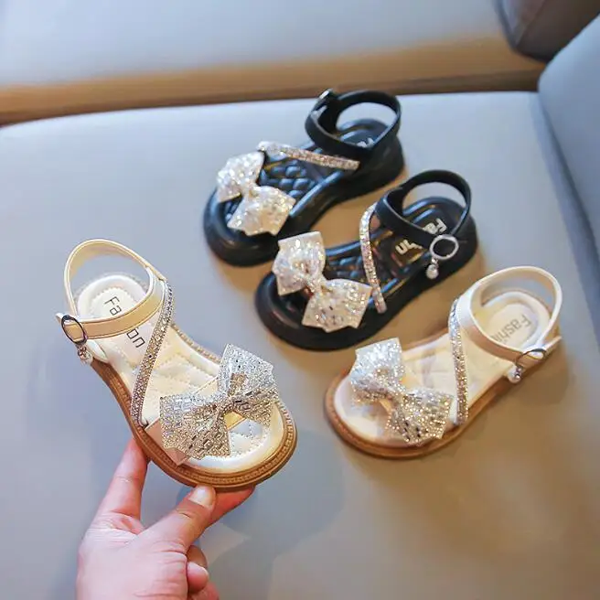 

Summer Girls Sandals Pearl Rhinestone Bow Fashion Princess Beach Shoes New Girls Shoes Non-slip Kids Sandals Leather Sandals