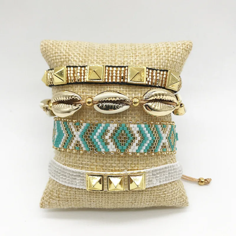 Браслет из бисера оригинальный дизайн со стрелкой морская ракушка ручное