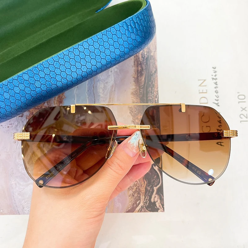 ZI80127 Овальные модные солнцезащитные очки без оправы из титана и ацетата с