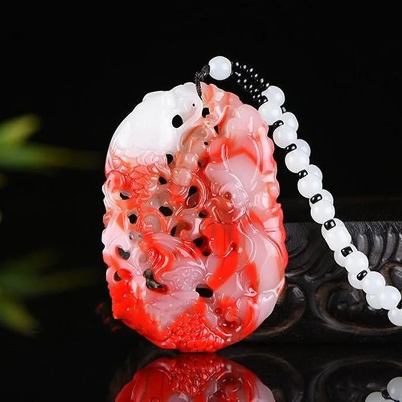 

Xinjiang Hetian Jade Chicken Blood Jade Double-sided Carved Hollow Pendants for Men and Women Every Year