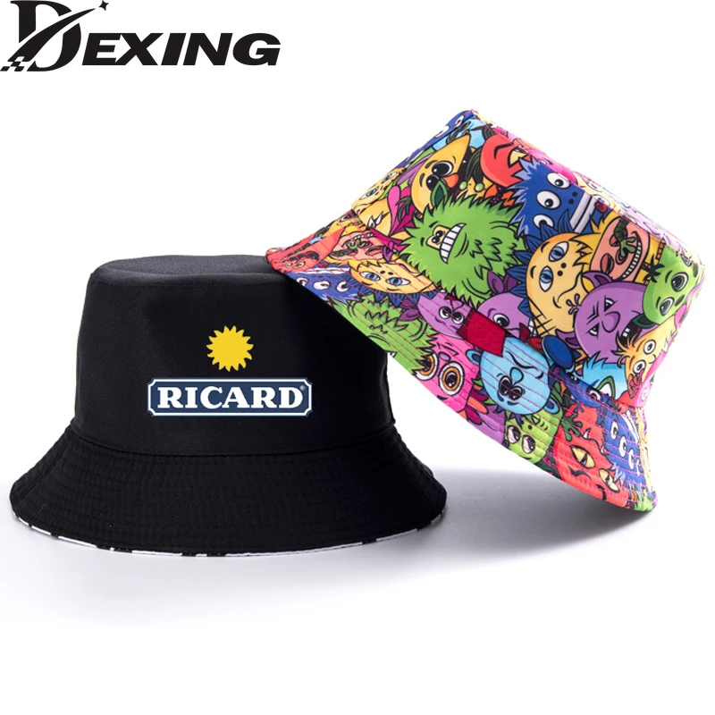 

Cartoon RICARD Reversible Bucket Hats Unisexe Man Women Ricard Fisherman Caps Girl Boy Outdoor Graffiti Chapeau Bob Hat