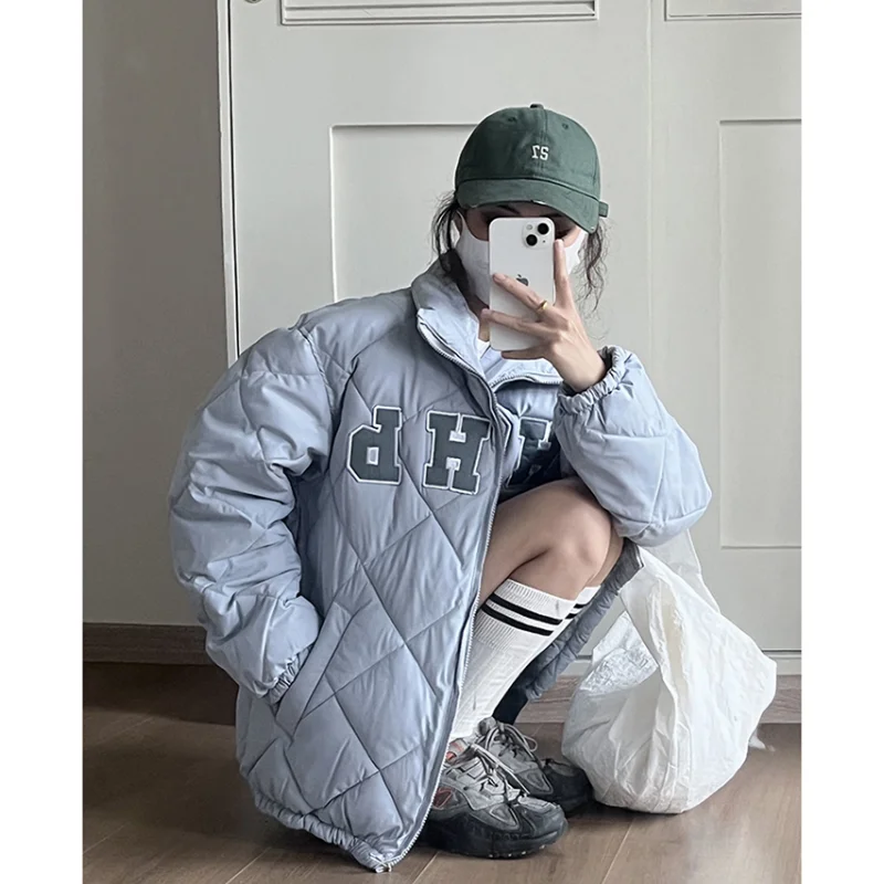 Женский зимний пуховик с вышивкой и защитой от ветра