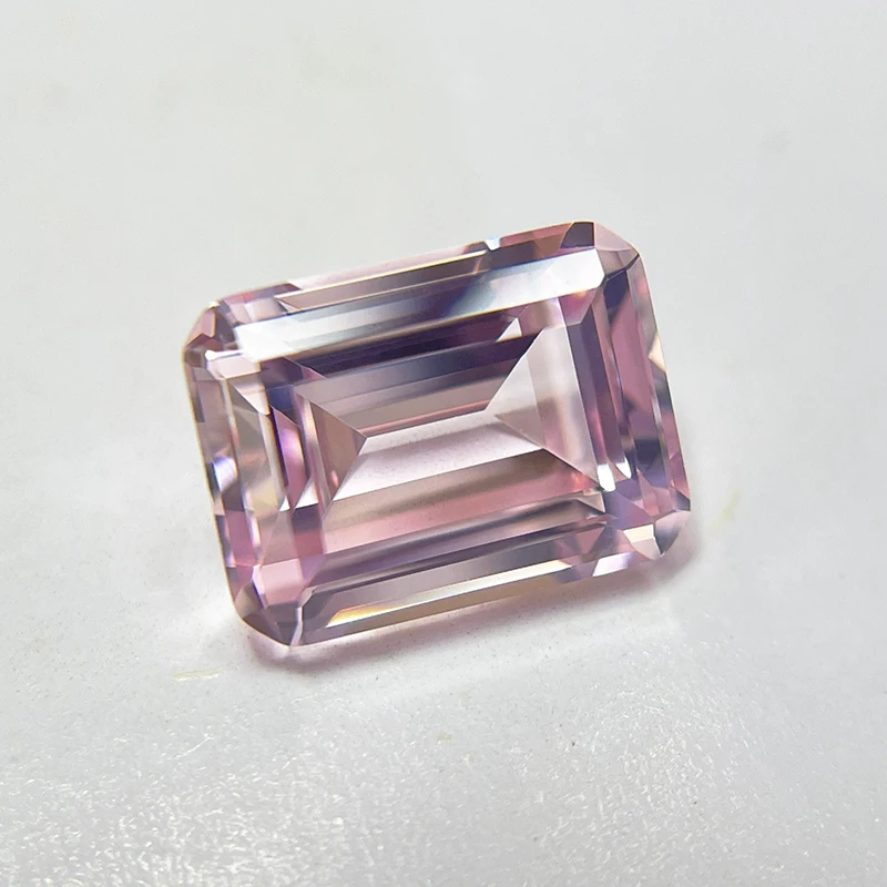 Выращен в лаборатории сапфир изумрудной огранки восход солнца розовый цвет