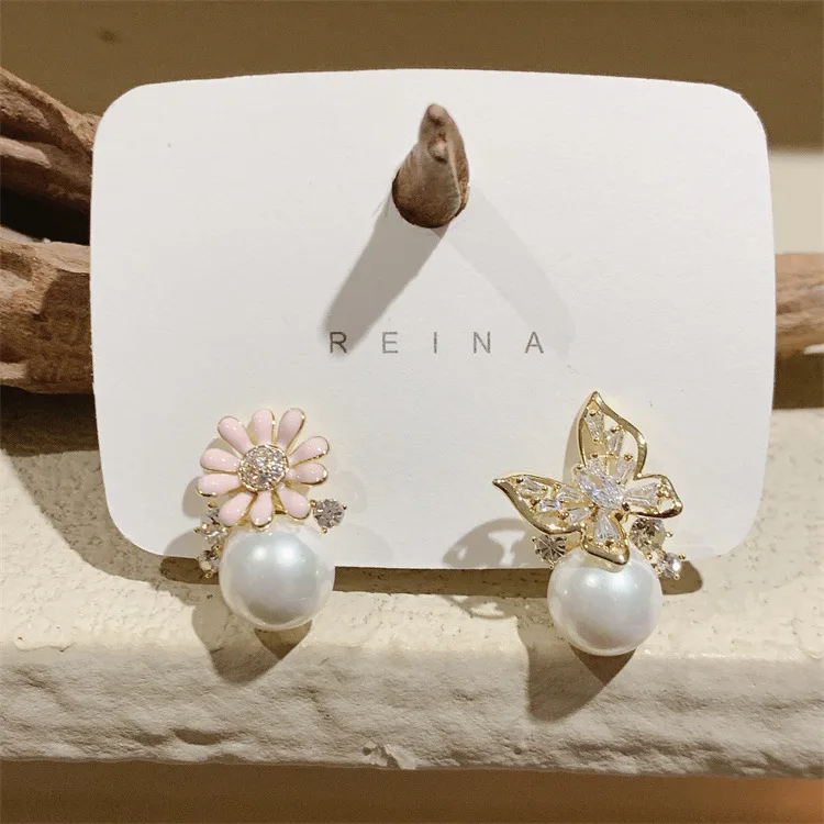 

Korean Fashion Creative Personalized Design Butterfly Flower Pearl Light Luxury Premium Earrings for Women Jewelry.